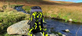 Mountain Warehouse Carrion 65L Rucksack by water