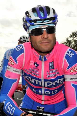 Alessandro Petacchi (Lampre-ISD) was relegated and punished with a one minute penalty for punching another rider.