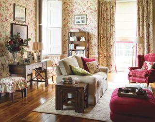 Traditional curtains matching a floral wallpaper in a period living room