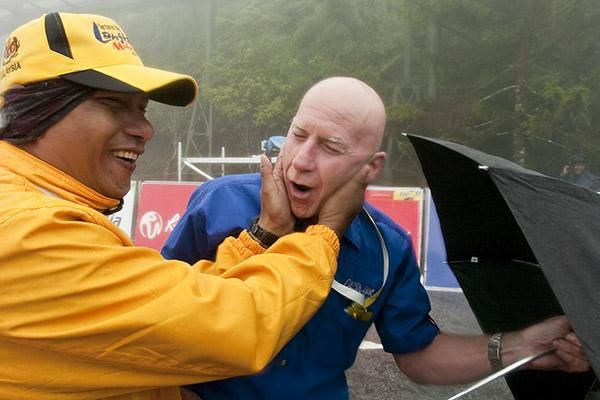 Man your hands are cold: Conditions were horrendous for not only the riders but for tour officials at the top of Genting Highlands.
