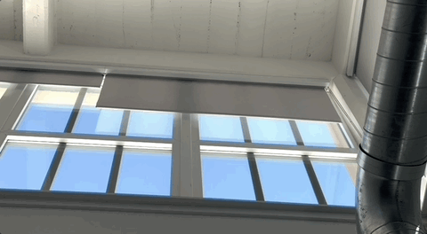 Ryse SmartShade opening a window shade.