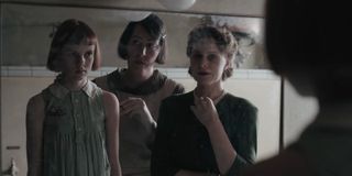 Isla Johnston, Rebecca Root, and Christiane Seidel in The Queen's Gambit