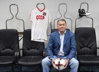 Oleg Blokhin poses in the Dynamo Kyiv changing room in front of a Soviet Union shirt in 2018.