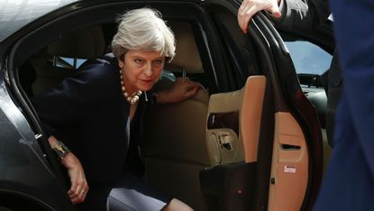 Theresa May arrives at Brexit talks