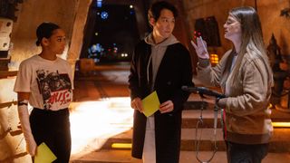 Behind the scenes photo of Amandla Stenberg, Lee Jung-jae and Leslye Headland on set for The Acolyte