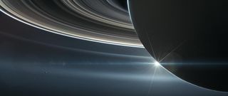 An artist's depiction of the Cassini spacecraft orbiting Saturn near the end of its mission.