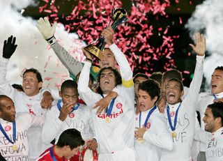 Internacional players celebrate after victory against Barcelona in the final of the FIFA Club World Cup in December 2006.