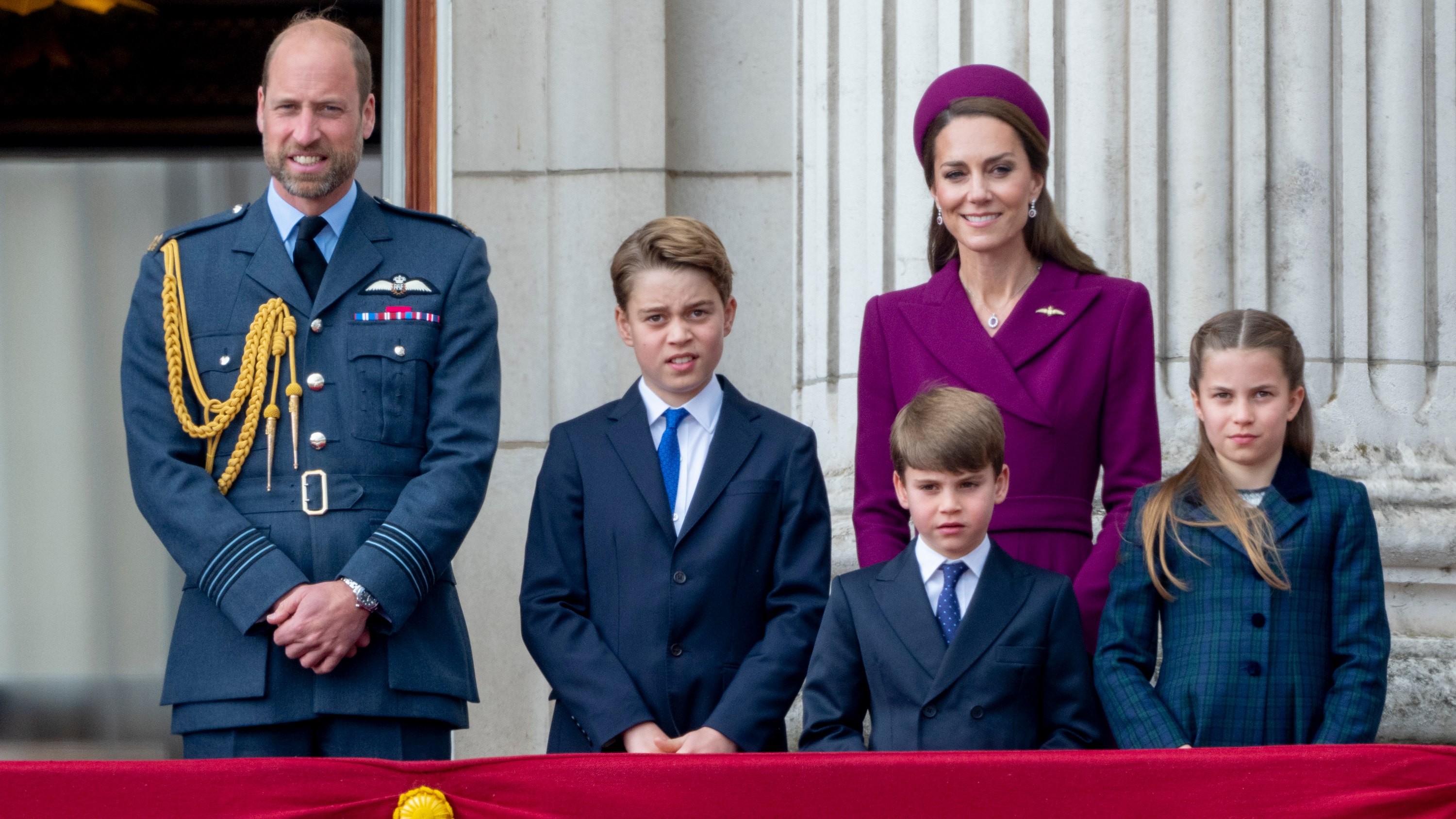 Prince William and Catherine, Princess of Wales with Princess Charlotte, Prince George and Prince Louis watch a flypast from the balcony of Buckingham Palace after the military procession to mark the 80th anniversary of VE Day on May 5, 2025