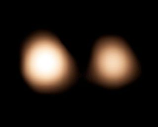 ALMA radio observatory in Chile observed Pluto and its largest moon, Charon, on July 15, 2014.