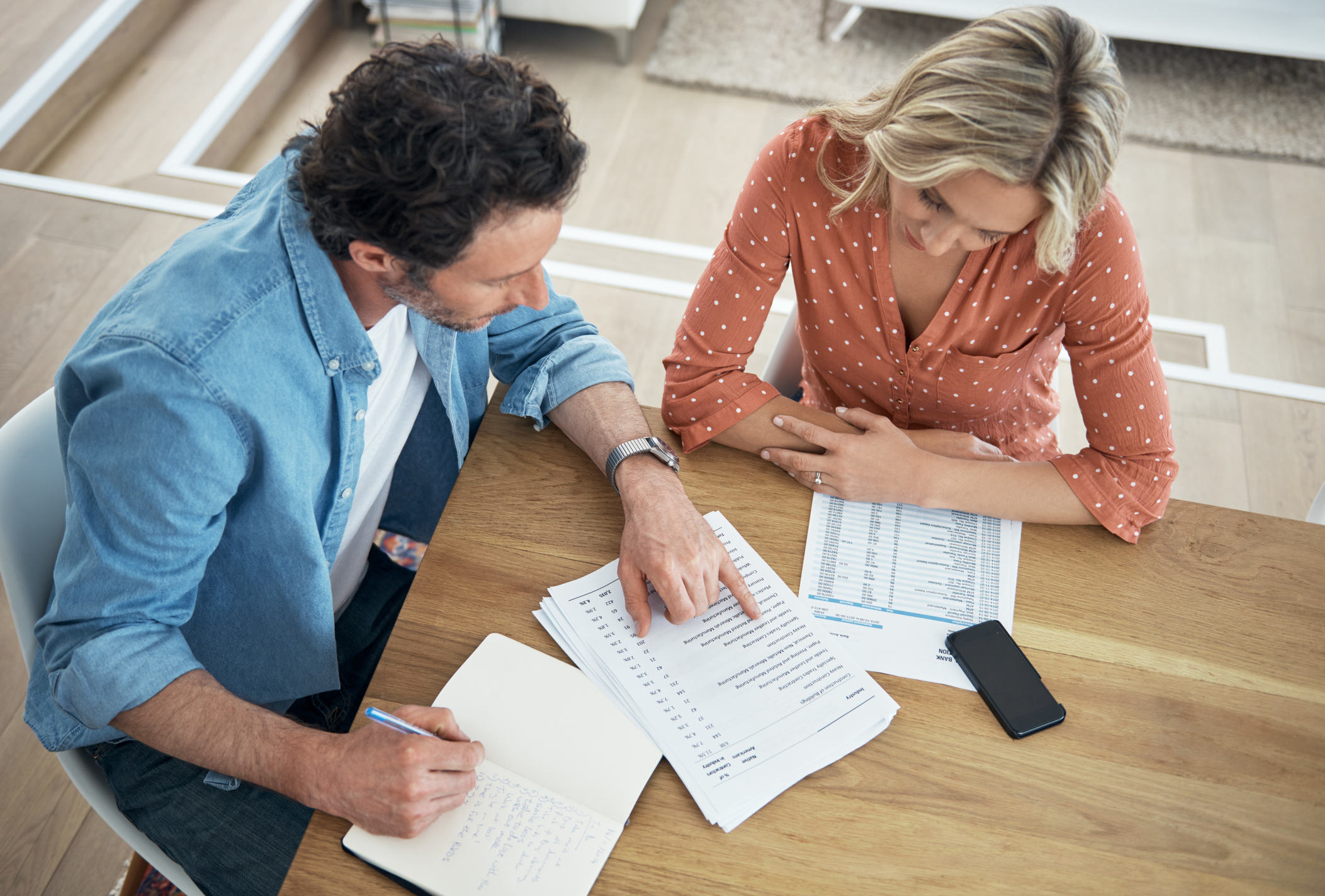 A couple going over their household budget