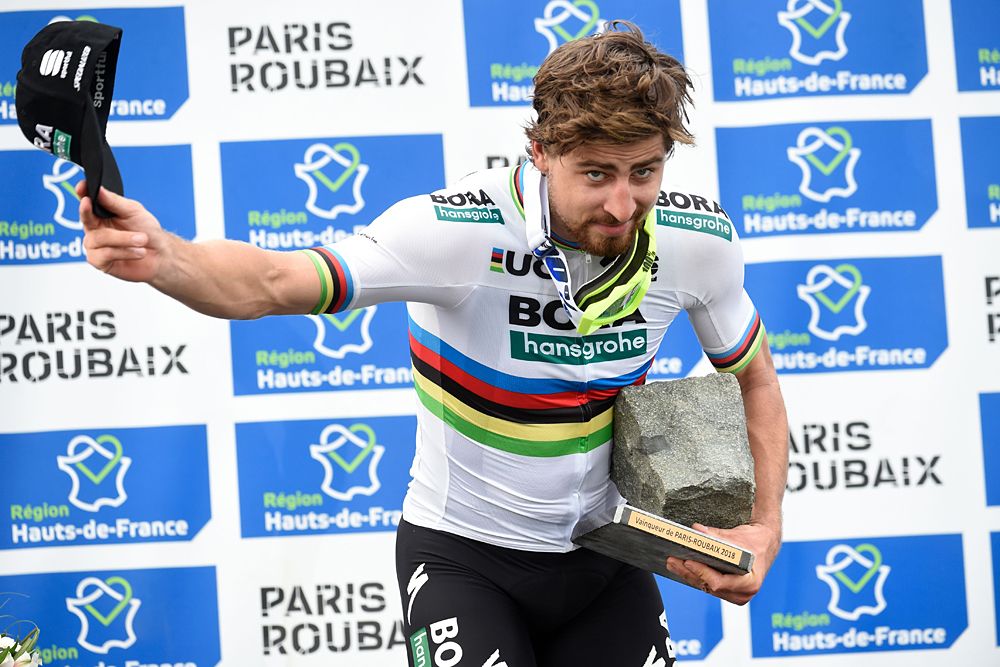 Peter Sagan (Bora-Hansgrohe) bows to the crowds on the podium after winning 2018 Paris-Roubaix