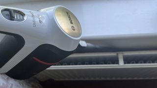 bosch unlimited 7 being used as a handheld vacuum