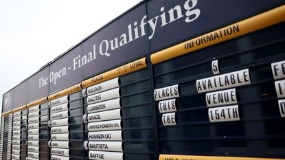 A board of scores with Open Championship Final Qualifying on it