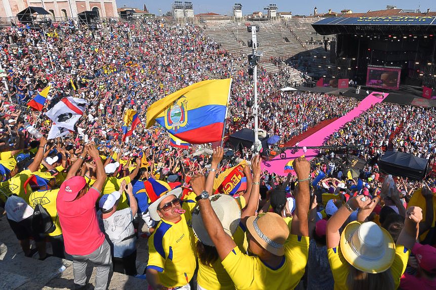 Spectators celebrate Richard Carapaz's overall win at the 2019 Giro d'Italia