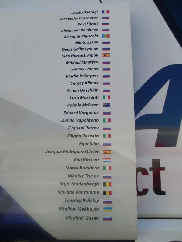 The 2011 Katusha team roster is displayed on the bus.