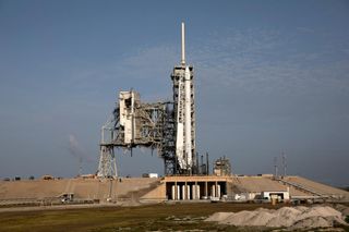 Falcon 9 and Used Dragon on the Pad