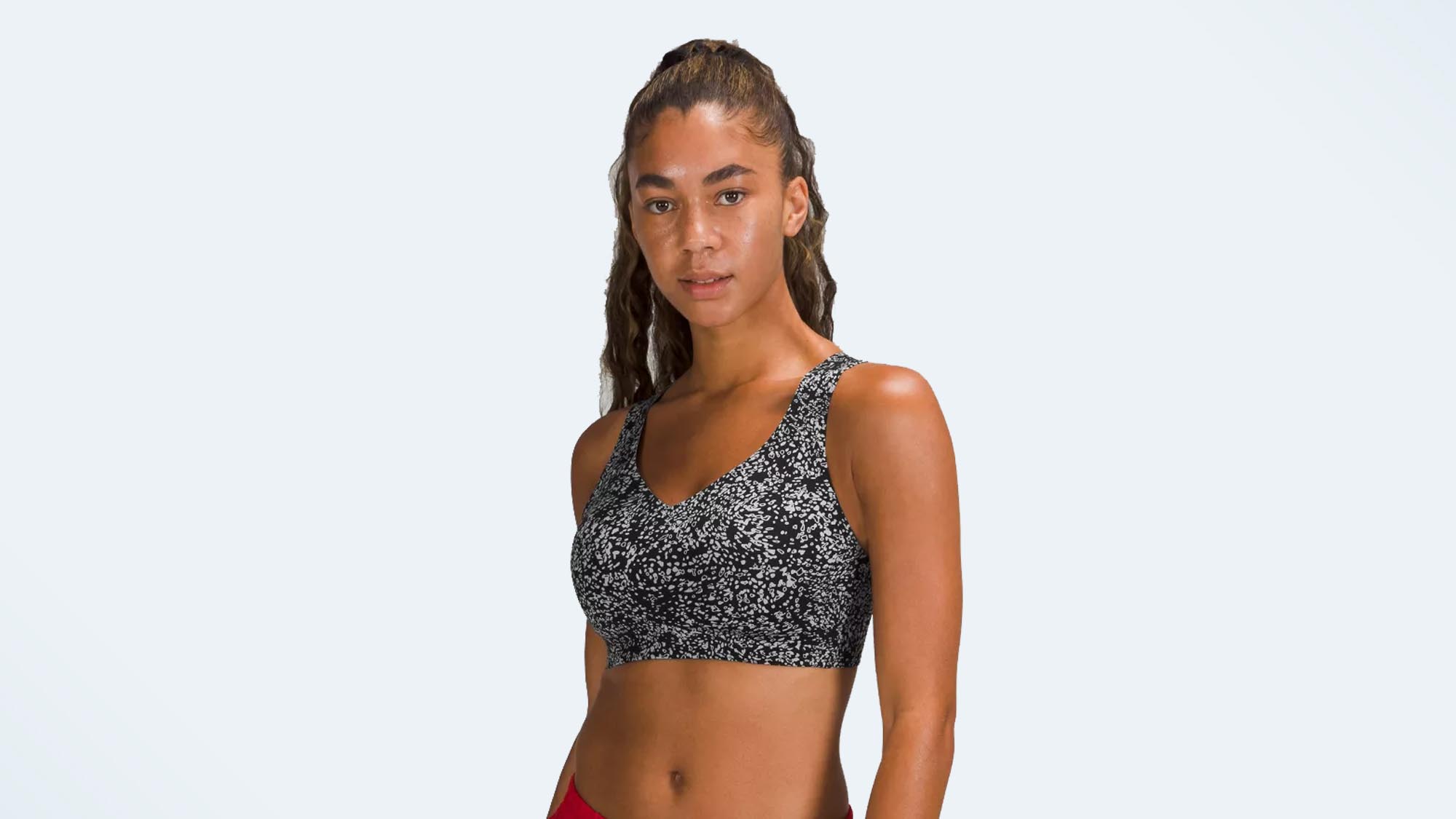 A photo of a woman wearing the Lululemon Enlite Bra, one of the best high-impact sports bras