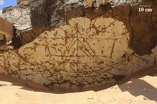 One of the 120 incised boat images found in the 3,800-year-old structure. The sail on this boat is unfurled.