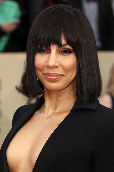 Hair, Face, Hairstyle, Bangs, Black hair, Eyebrow, Chin, Beauty, Layered hair, Brown hair,