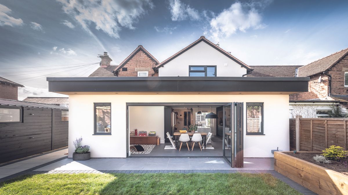 a white single storey extension to a property