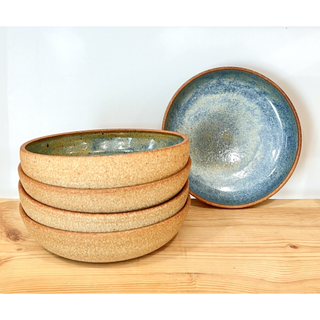 ceramic bowls with blue interior and brown exterior