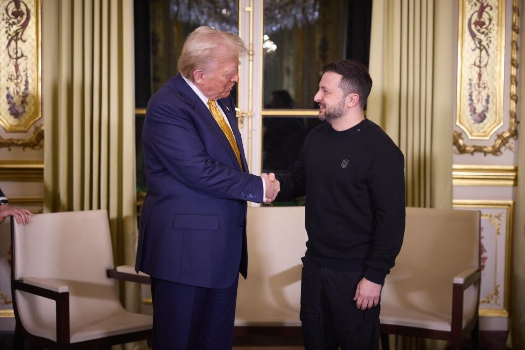 Donald Trump and Volodymyr Zelenskyy shake hands