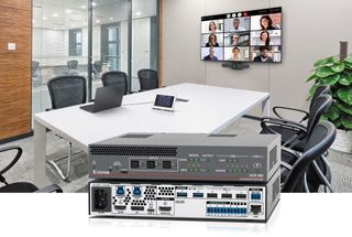 The new Extron 4K Collaboration and Presentation Switcher with USB-C in front of a conference room setting. 
