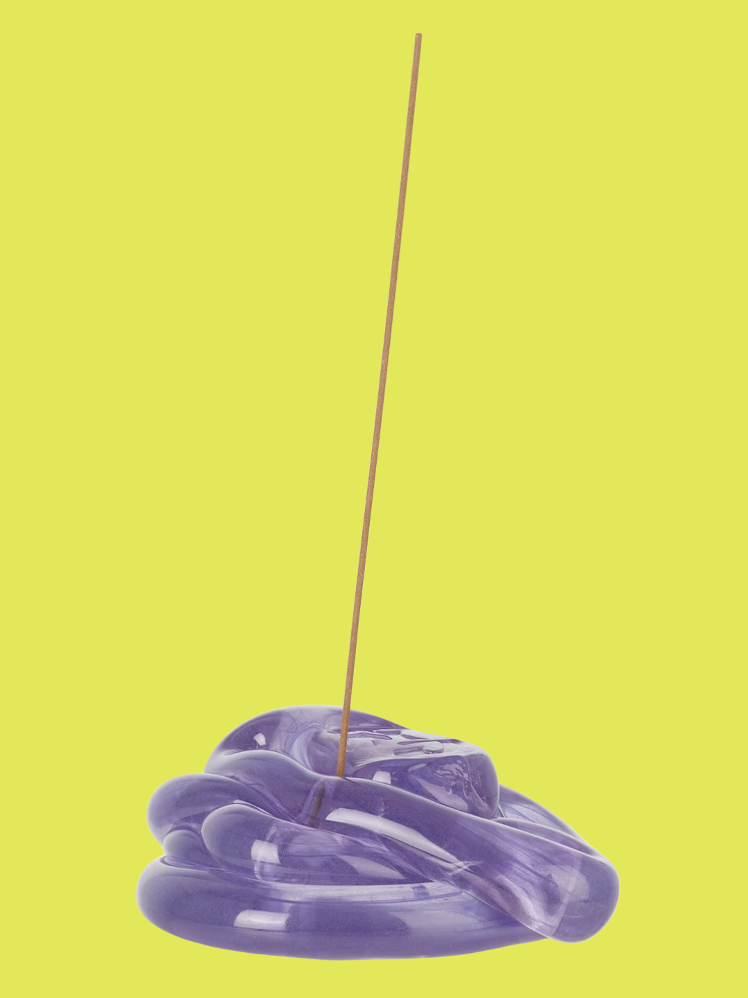 A pooled purple glass incense holder from Niko June