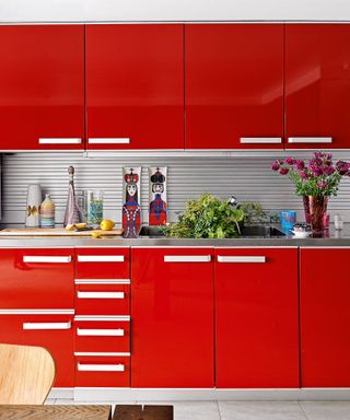 Red interiors micro trend in a kitchen