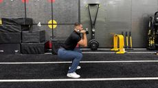 man doing exercise in the gym