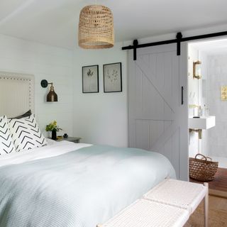 farmhouse with modern extension decorated in shades of grey and white