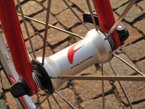 Radially-laced straight-pull bladed stainless steel spokes are used up front