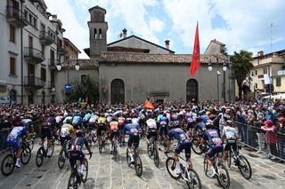 GORIZIA ITALY MAY 23 The Peloton at start in Grado Village during the 104th Giro dItalia 2021 Stage 15 a 147km stage from Grado to Gorizia Fans Public UCIworldtour girodiitalia Giro on May 23 2021 in Gorizia Italy Photo by Stuart FranklinGetty Images