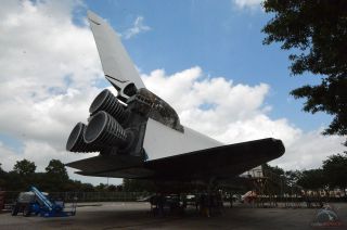 The exterior of the replica shuttle Independence at Space Center Houston is receiving a new skin, including the replacement of the numbered heat shield tiles that line its underbody. Click here for more photos.