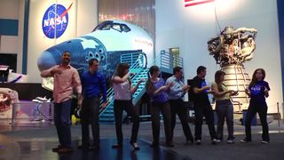 NASA interns dance among space artifacts and a space shuttle mockup in "All About That Space," a music video parody set to the tune "All About That Bass" by Meghan Trainor.