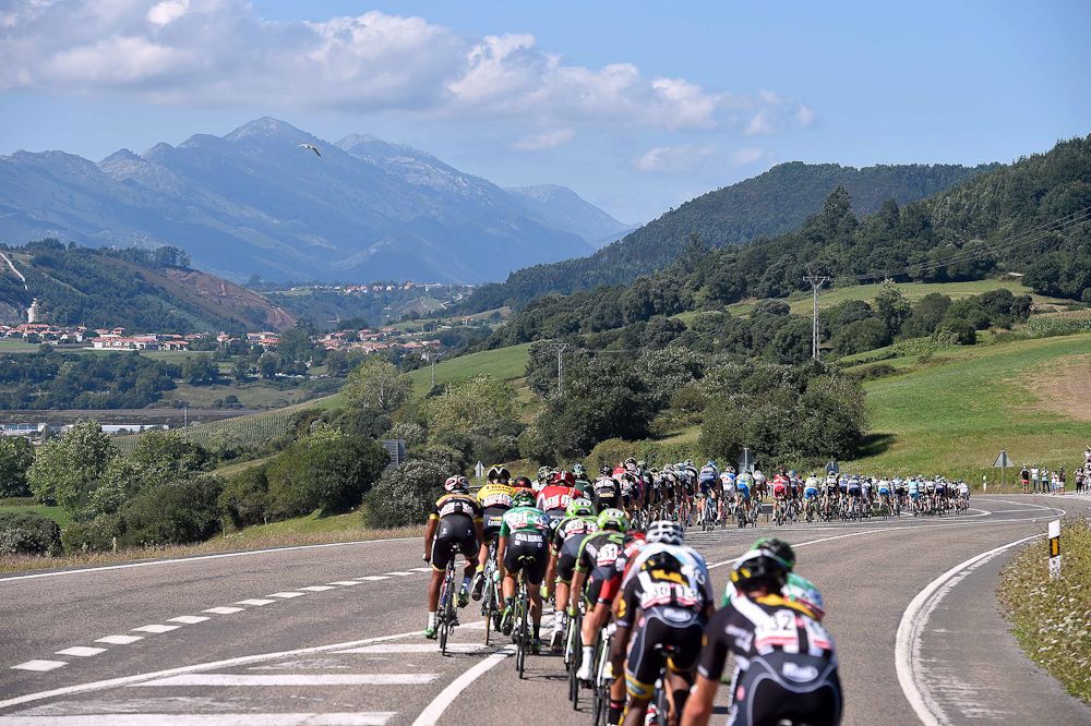 The peloton rides through the Spanish countryside during stage 15.