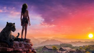 Rohan Chand as Mowgli looking out into the distance during the Netflix fantasy movie Mowgli: Legend of the Jungle.