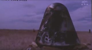 This still from a CCTV news report show's China's next-generation space capsule after its uncrewed test flght and landing on May 8, 2020 in the Inner Mongolia Autonomous Region.