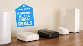 A picture showing several mesh routers with a Black Friday deals badge