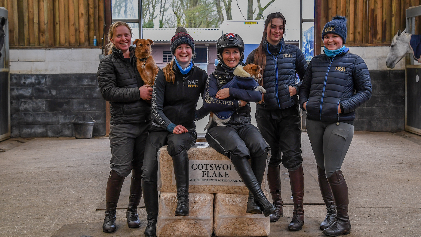 Laura Collett with staff and dogs