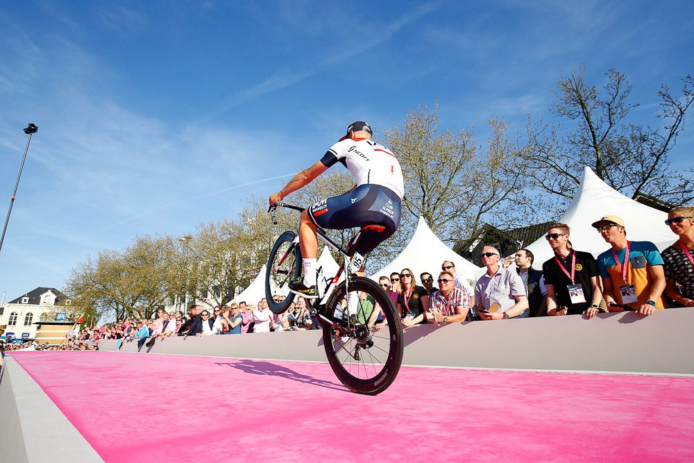 Matteo Pelucchi (IAM Cycling) does a wheelie for the crowd