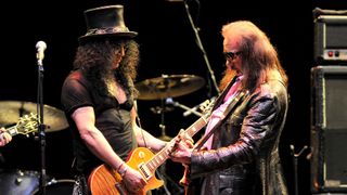 Slash and Ace Frehley perform at the 6th Annual MusiCares MAP Fund Benefit Concert at Club Nokia on May 7, 2010 in Los Angeles, California.