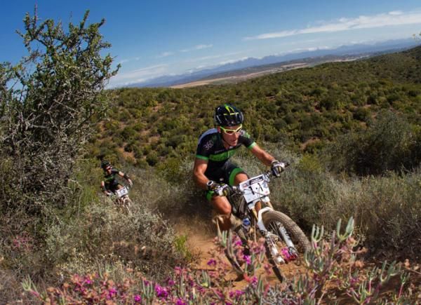 Kevin Evans (front) and David George of Nedbank 360Life won the prologue time trial stage through Buffelsdrift Game Reserve at the 2012 Cape Pioneer Trek international mountain bike stage race.