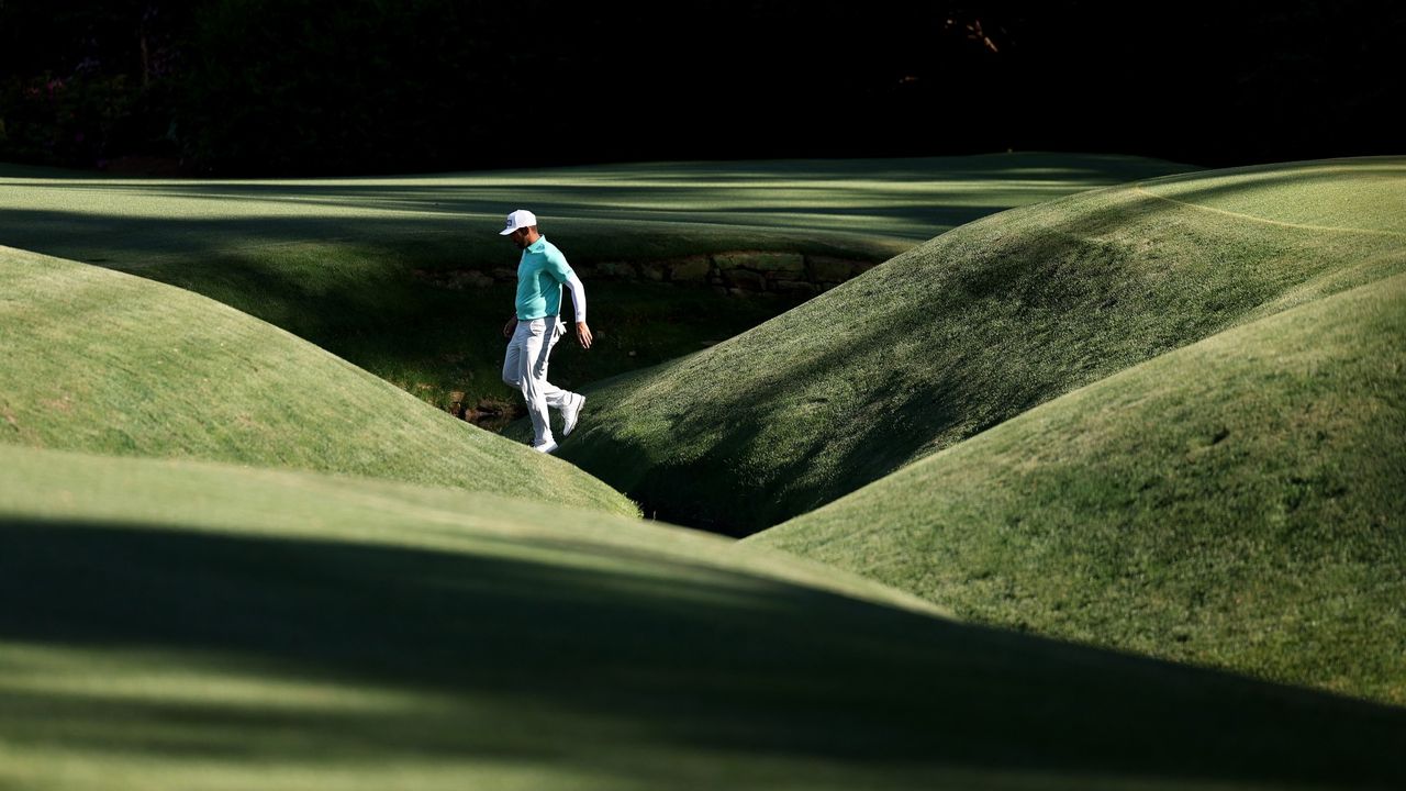 France&#039;s Matthieu Pavon walks over Rae&#039;s Creek on the 13th hole during the third round of the 2024 Masters Tournament at Augusta National Golf Club 