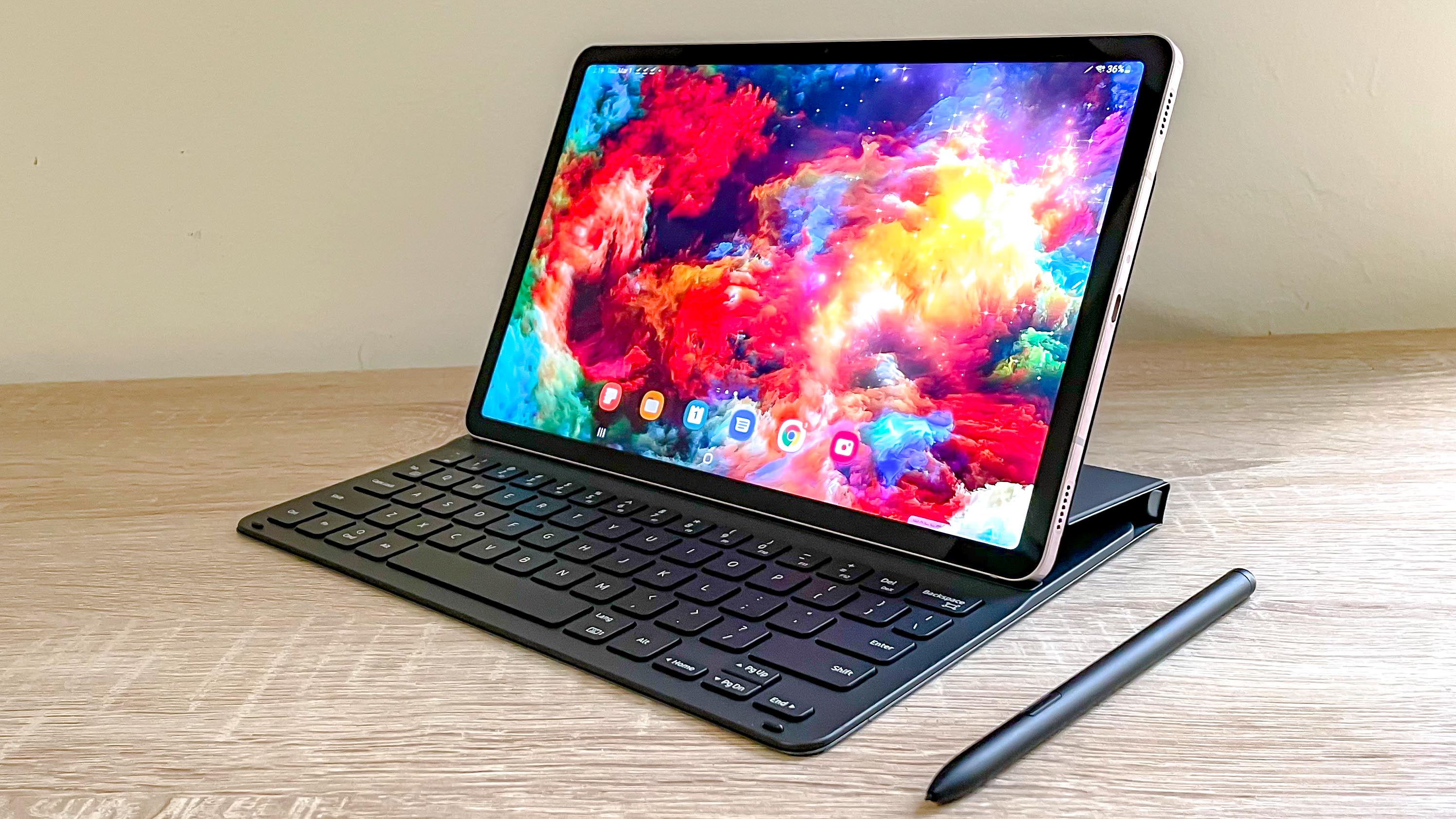 Samsung Galaxy Tab S8 open in keyboard cover on desk, facing left