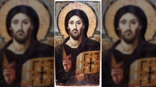 The oldest known icon of Christ Pantocrator, 6th-century encaustic icon from Saint Catherine's Monastery, Mount Sinai. Here we see a man with long brown hair, a short brown beard and moustache. He's holding a large golden bible with a black cross on it in his arms.
