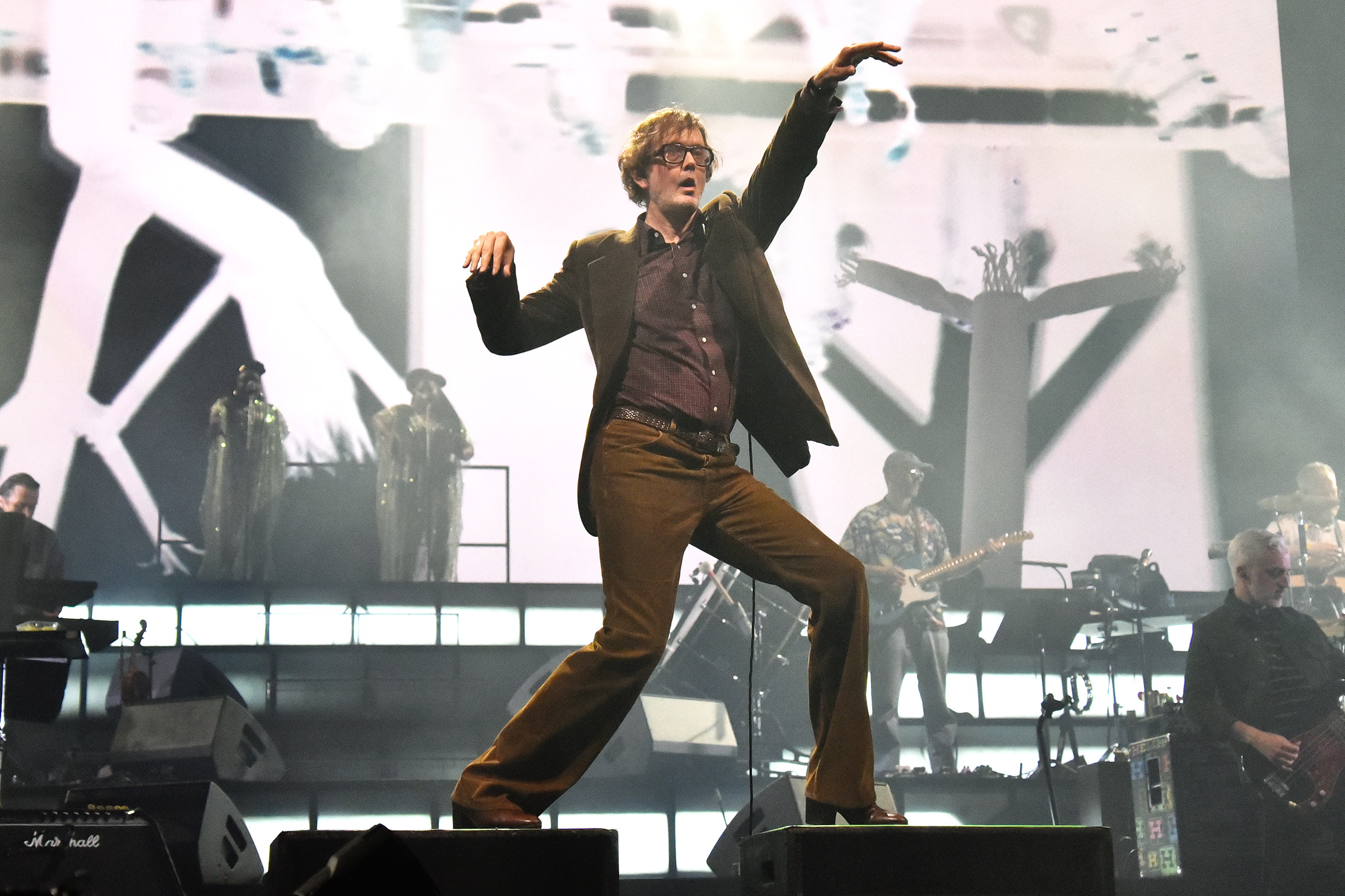 Jarvis Cocker does Jarvis Cocker things at a Pulp concert