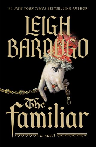 the familiar by leigh bardugo book cover with a hand holding a chain