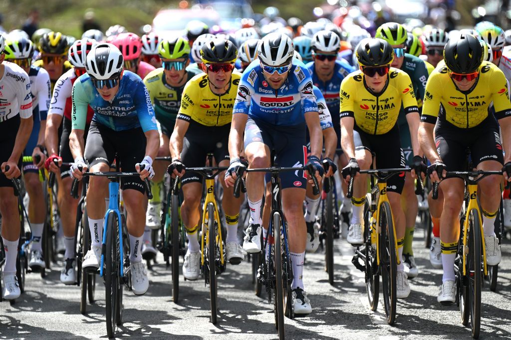 LEGUTIO SPAIN APRIL 04 LR Valentin Retailleau of France and Decathlon AG2R La Mondiale Team Pieter Serry of Belgium and Team Soudal QuickStep and Jonas Vingegaard Hansen of Denmark and Team Visma Lease a Bike compete during the 63rd Itzulia Basque Country 2024 Stage 4 a 1575km stage from Etxarri Aranatz to Legutio 550m UCIWT on April 04 2024 in Etxarri Legutio Spain Photo by Tim de WaeleGetty Images