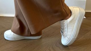 Caroline Parr wearing Air & Grace Sadie platform trainers